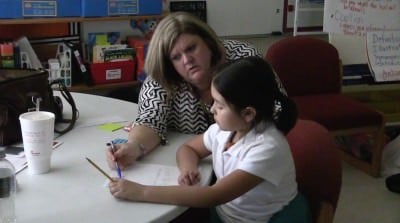 Teacher helping a student at Trenton Elementary School