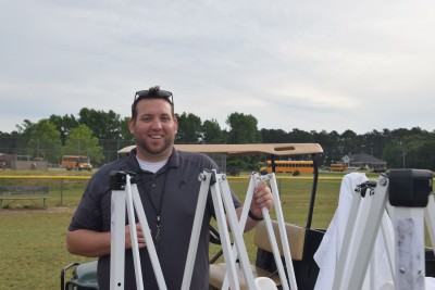 Nate Adair setting up for field day