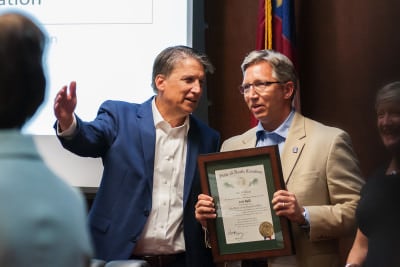 Governor Pat McCrory, left, awarding Community College President Scott Ralls The Order of the Long Leaf Pine (Photo Credit: Governor's Flickr account) 