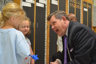 Woodard, right, talks with some Pearsontown students (Photo Credit/Alex Granados)