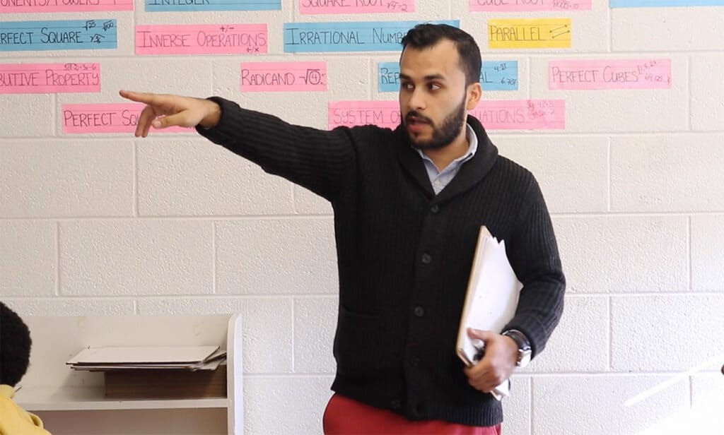 First-year teacher Jawad Wahabzada teaching eighth-grade math at Rochelle Middle School. (Photo credit: Todd Brantley/EdNC)