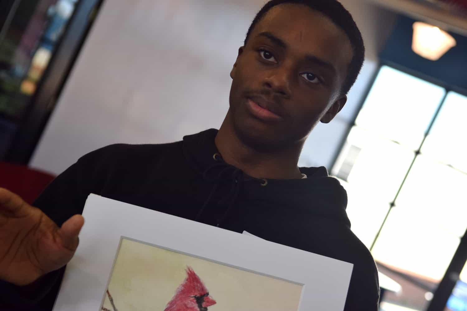 Bobby HIll won an honorable mention in the Congressional Art Competition. "I'm a busy person," he says to Forte-Brown.