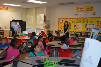 Savill looks over one of her Classrooms of Tomorrow.