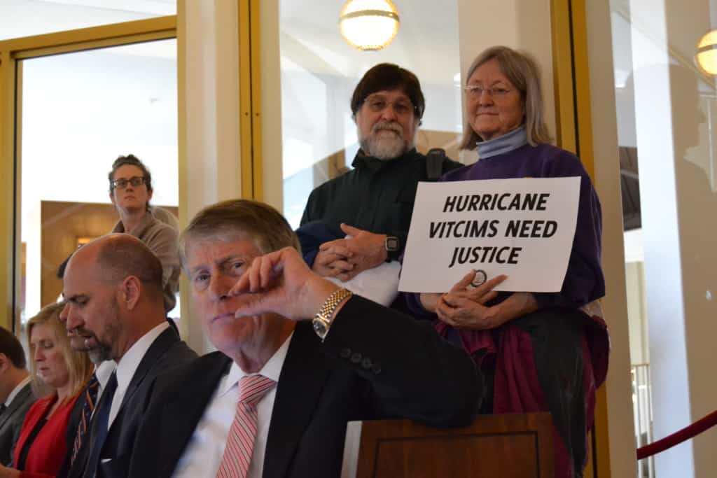 Protestors inside the Senate chamber. (Photo Credit: Liz Bell/EducationNC)