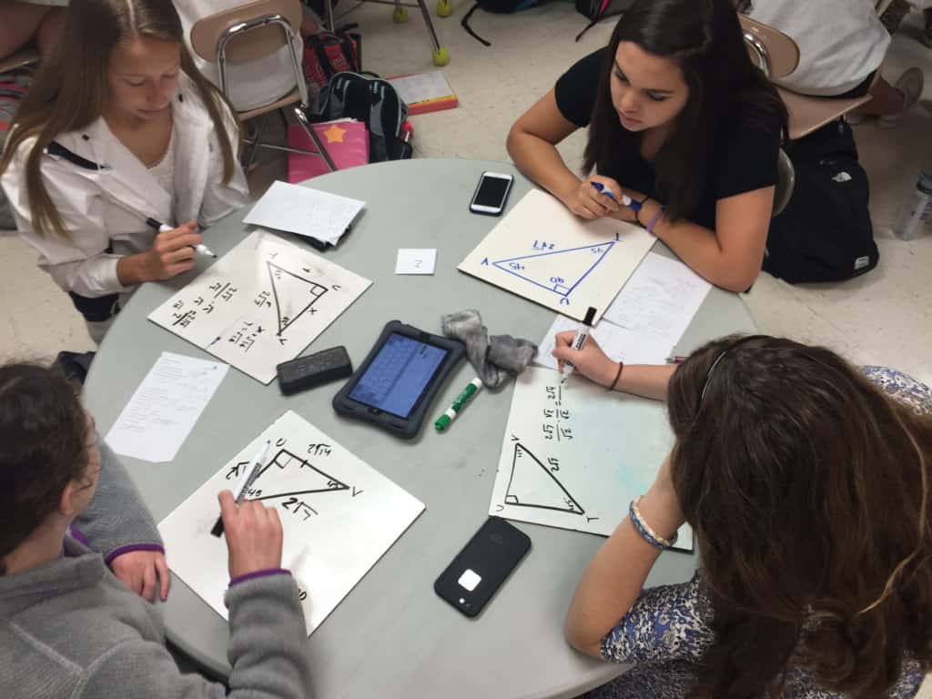 Students in Mr. Ferguson's Honors Math 2 class at Leesville Road High School in Raleigh practice problems containing special right triangles. 
