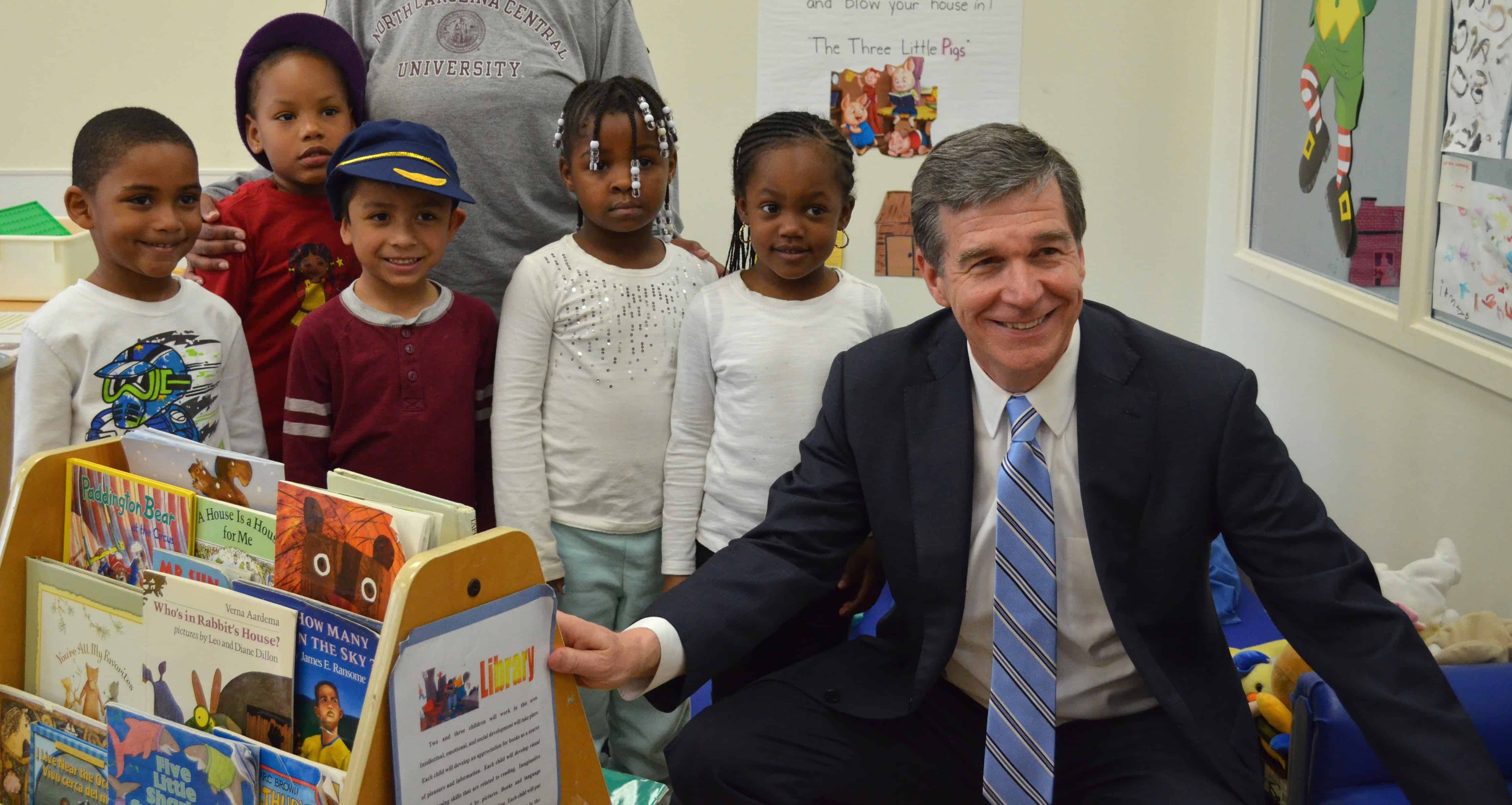Governor Roy Cooper with children at Guilford Child Development in Greensboro