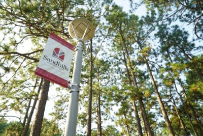 an SCC banner on a pole