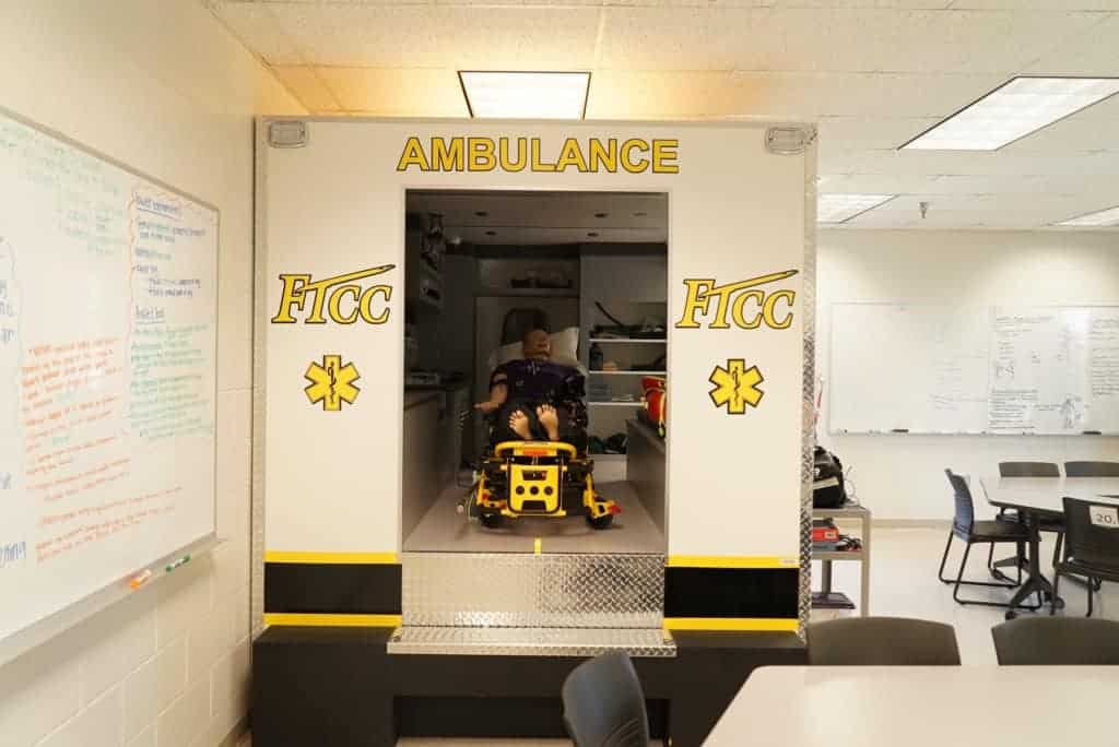 An ambulance replica in a classroom