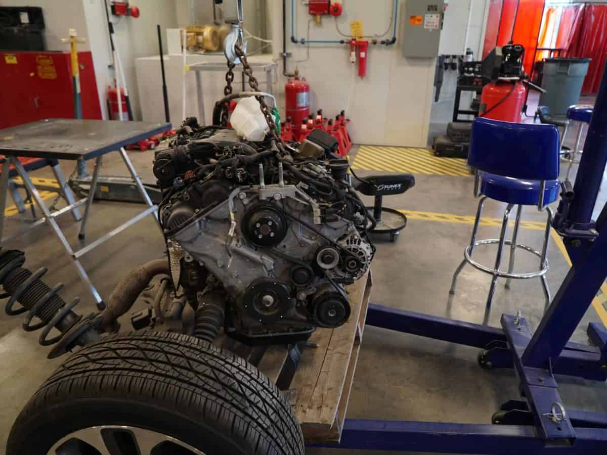 An engine partly disassembled.