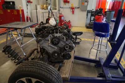 An engine partly disassembled.