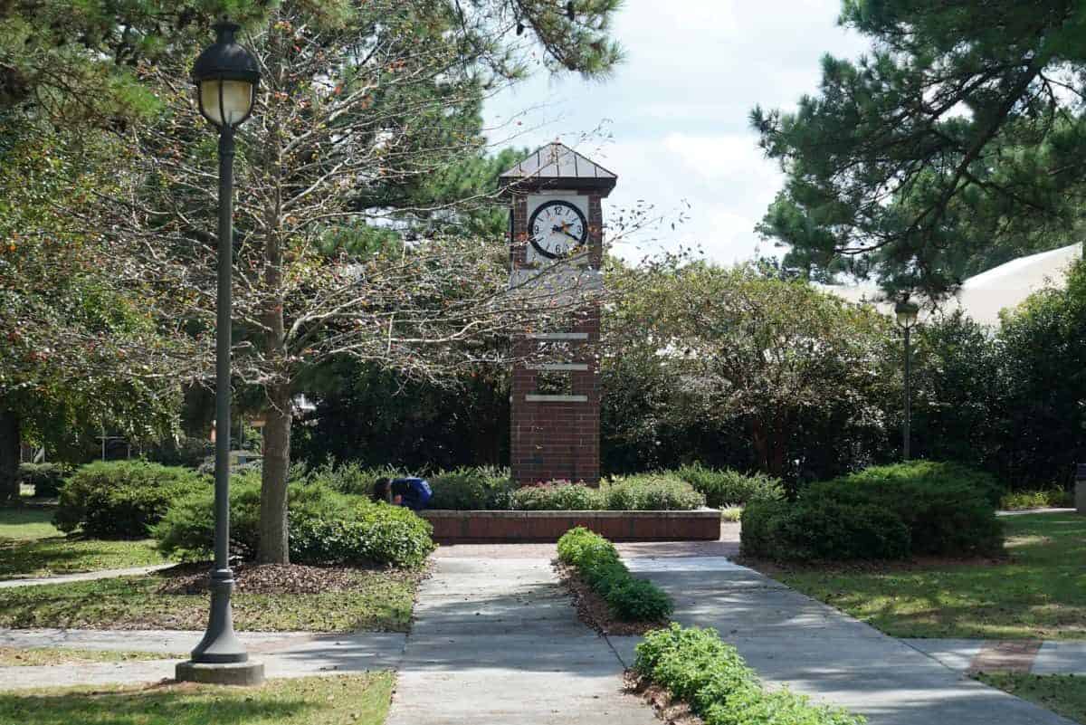 a walkway and bell tower