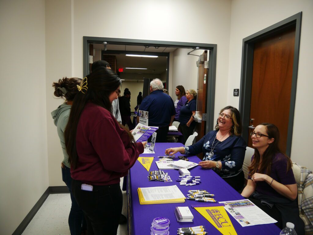 Students receive information on ECU at Let's Connect at James Sprunt Community College. Laura Browne/EducationNC
