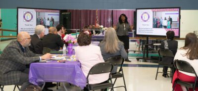 woman standing in front of room