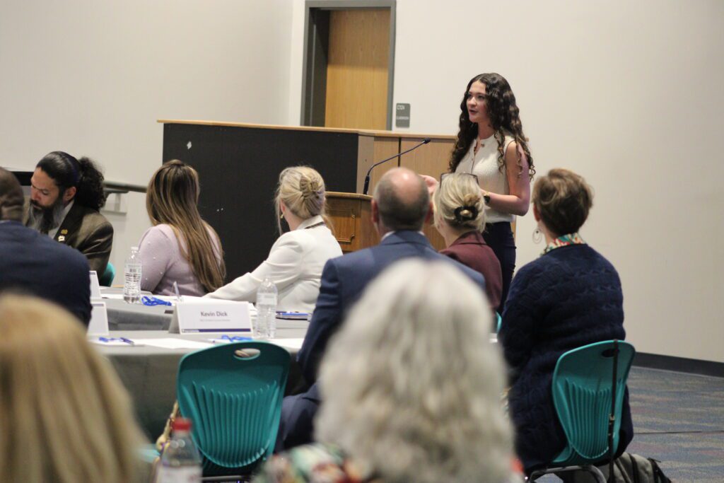student speaking at podium