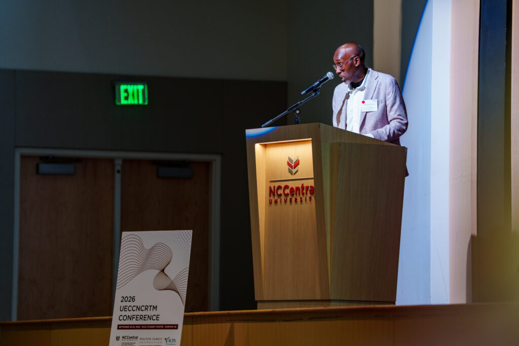 A person speaks at a podium during the 2026 UECCNCTM Conference at NC Central University.